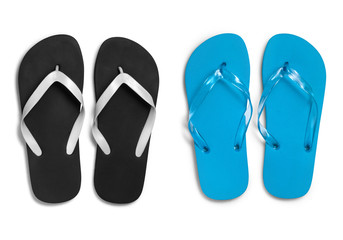 Black and blue rubber slippers on white background with clipping path