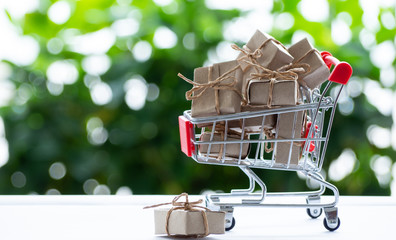 Gift Box from many small paper in a cart, Concept Online shopping  an gifts for special day.