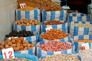 peanuts almonds and pistachio on display