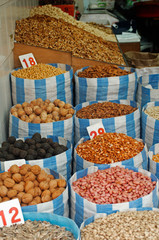 peanuts almonds and pistachio on display