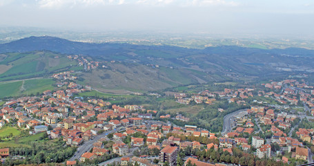 Fototapeta na wymiar Residential areas at the foot of the mountains in the Republic of San Marino in Italy