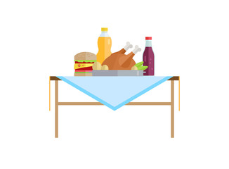 Fast Food and Soda or Juice in Bottles on Table