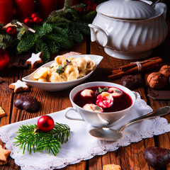 Obraz na płótnie Canvas Christmas beetroot soup- borscht with small dumplings