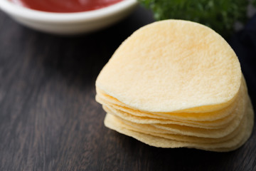 Potato chip on wood

