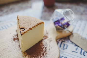 Handmade  Fluffy Japanese Cheesecake on wood Chopping board.