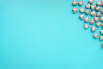 Group of hearts on blue background