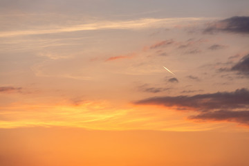Beautiful sunset sky. Sun, sunset, sunrise. Colorful toned instant photo. Fiery orange sunset sky. Beautiful sky. Sunset / sunrise with clouds, light rays and other atmospheric effect