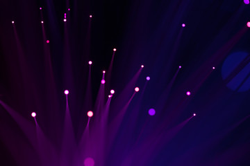 Abstract background a Optical fiber lamp. Closeup of colorful optical fibers