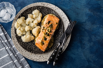 Solomon fillet with pineapple and cauliflower. Fish with vegetables.
