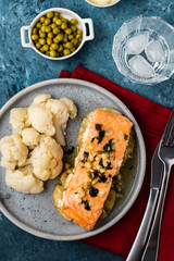 Solomon fillet with pineapple and cauliflower. Fish with vegetables.