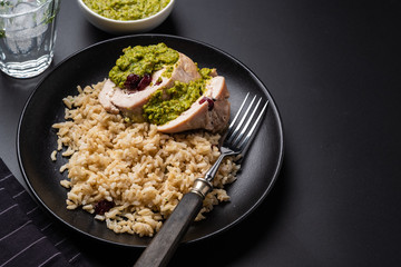 Sliced Chicken Roll with Cranberries, Pesto and Rice.