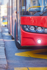 Public transportation / bus in urban surroundings on a station. © astrosystem