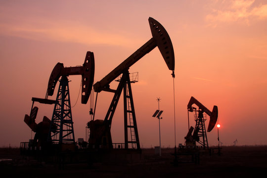 crank balanced beam pumping unit in a oilfield