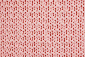 Knitted texture in Living Coral color of 2019.