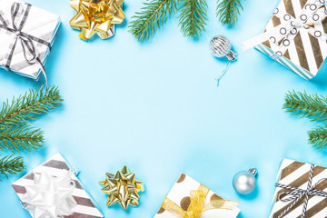 Christmas flatlay background - silver and gold decorations on bl