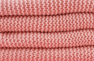 Knitted texture in Living Coral color of 2019.