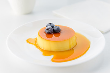 Cream caramel on a white background. Caramel pudding. Cream pudding.