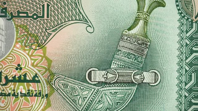 United Arab Emirates ten dirham banknote rotating, UAE Emirati currency closeup. 4K UHD video footage.