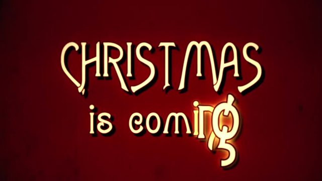A text message, fancy retro font, 1970s damaged film style, appearing with a letter enlargement animation: Christmas is coming, Are you ready?