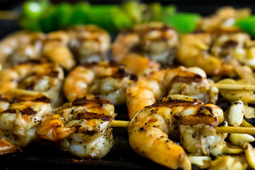 ready shrimp royal fried bbq with stripes series of sea delicacies close-up of focus in the foreground against a blurred background