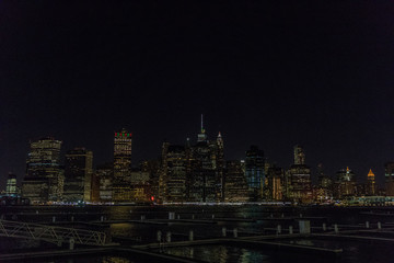 Fototapeta na wymiar Manhattan skyline panorama with Times Square lights at dusk, New York City