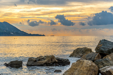 Sunset Light Reflected on the Beach Along the Southern Mediterranean Italian Coast