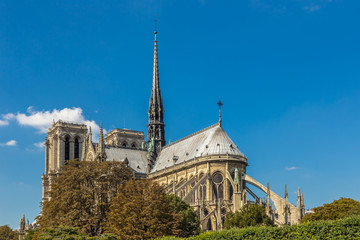 Fototapeta na wymiar Notre Dame Cathedral, Paris, France, against a blue sky.