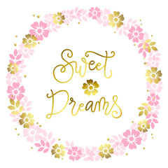 Modern calligraphy lettering of Sweet dreams in golden on white background with wreath of flowers for decoration, poster, banner, greeting card,postcard, advertising,holidays,valentine, valentines day