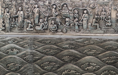 Thai style silver carving art on temple wall , Wat Srisuphan ,Chiang Mai, Thailand.