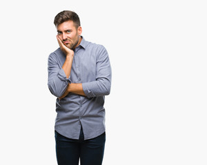 Young handsome man over isolated background thinking looking tired and bored with depression problems with crossed arms.