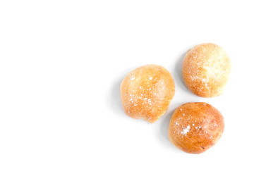 Baked bun with apple jam isolated on a white background.