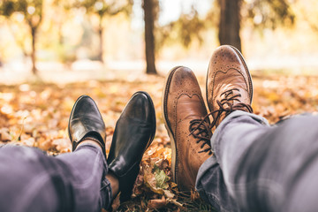 Modern couple resting in the park