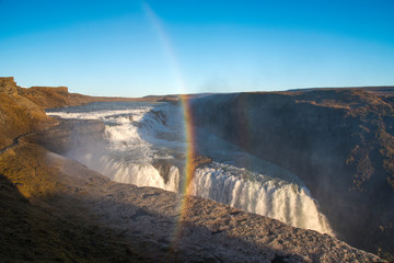 Amazing huge beautiful waterfall Gullfoss, famous landmark in Iceland, with rainbow
