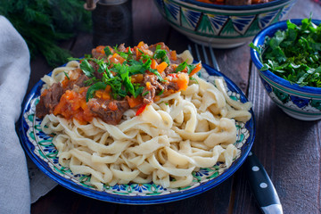 Cooked noodles made from wheat flour for lagman, horizontal