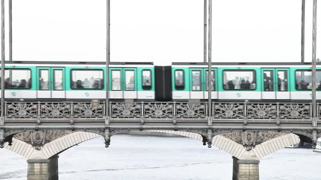 Paris Metro Underground Subway System Train Passing on Bridge in Paris, France 