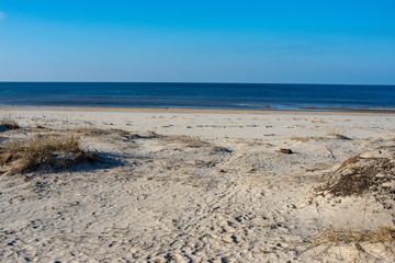 empty sea beach with sand dunes