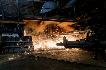 Fototapeta na wymiar Continuous casting machine with blow torch working
