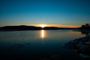 river, mountains, ice, water, sun, reflection, sky, evening, sunset
