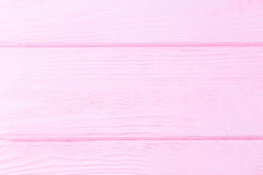Pink wooden background. Wooden textured background. Copy space for text