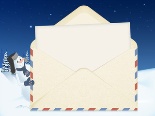 a happy snowman in a hat with earflaps Peeps out from behind an open envelope with a clean sheet of paper. evening winter forest in the background