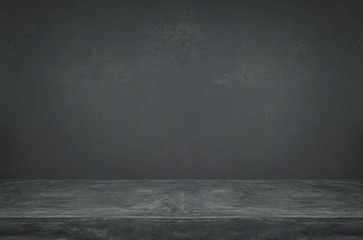 Empty grunge dark cement wall and table top background