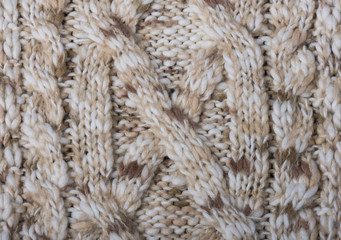 Soft natural wool texture with a pattern for the background.  Selective focus