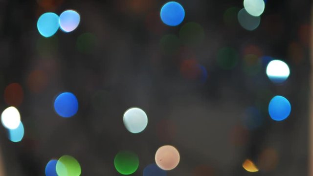 Defocused bokeh lights background. Abstract sparkles