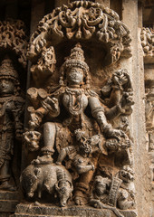 Artistic stone sculptures of Hindu Gods and Goddesses at Somanathapura Temple, Karnataka, India