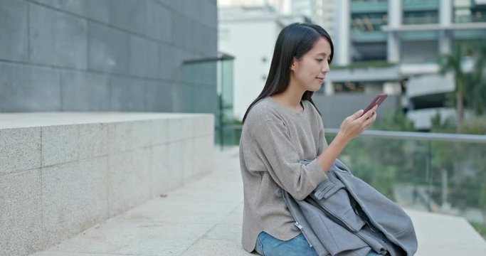 Woman use of mobile phone