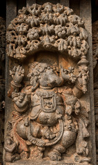 Artistic stone sculptures and carvings of Hindu Gods and Goddesses at Somanathapura Temple in Karnataka, India. 