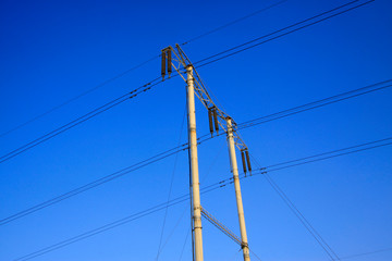 Fototapeta premium telegraph poles in the blue sky background