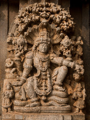 Artistic stone sculptures and carvings of Hindu Gods & Goddesses at Somanathapura Temple in Karnataka, India. 