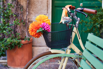Flower bouquet on a bicycle in a village in Italy