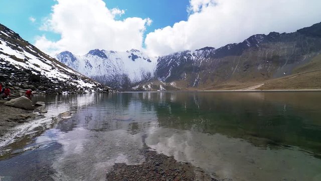 A nice view of the main lagoon, sun lagoon in the crater of the nevado de toluca volcano also called xinantecatl which is rarely this snowy